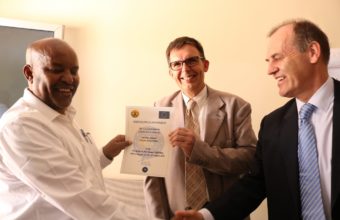 EUCS-giving-certificate-to-AGO-of-the-workshop-on-Anti-Human-Trafficking-5th-and-6th-August-2018